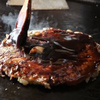 Okonomiyaki und Monja (Japanische salzige Pfannkuc